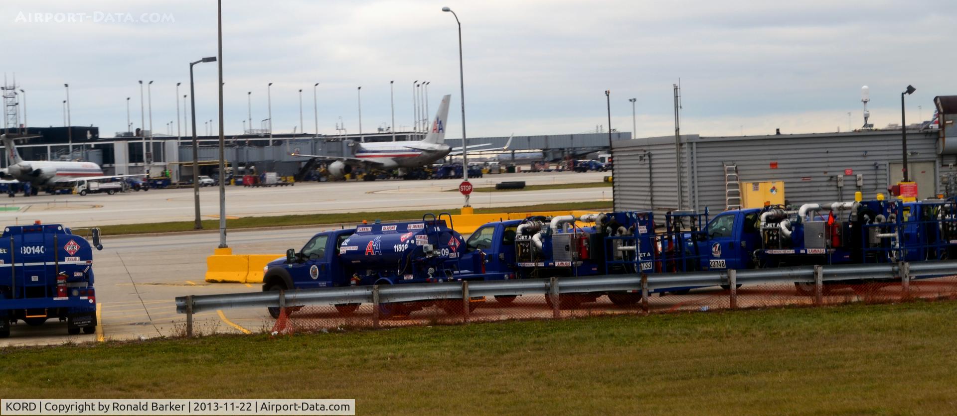 Chicago O'hare International Airport (ORD) - Line of American fuel trucks at O'Hare