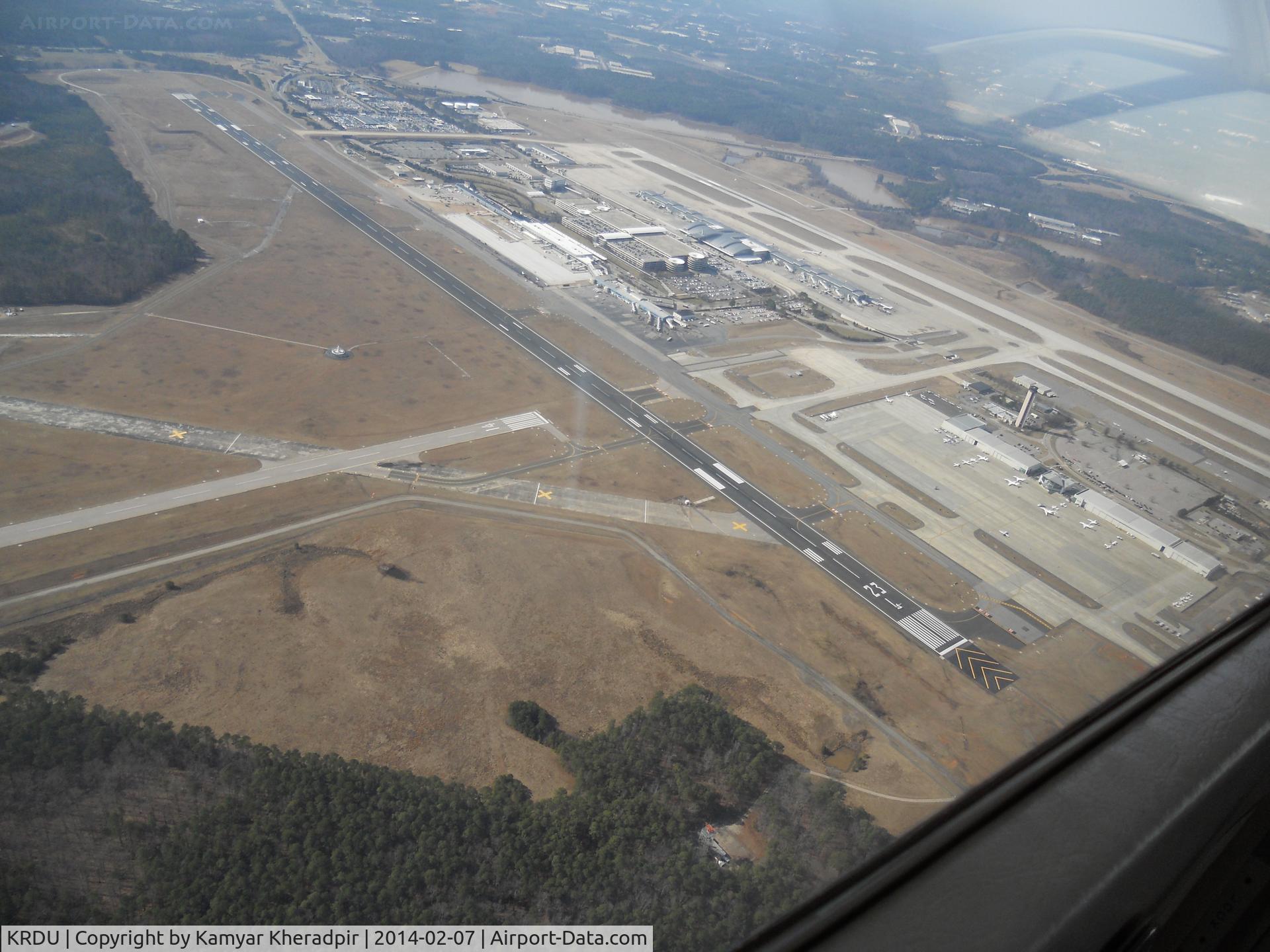 Raleigh-durham International Airport (RDU) - Directed to fly over the runway on the way to KJNX