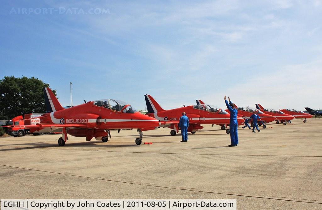 Bournemouth Airport, Bournemouth, England United Kingdom (EGHH) - Reds lining up on return to Cobham