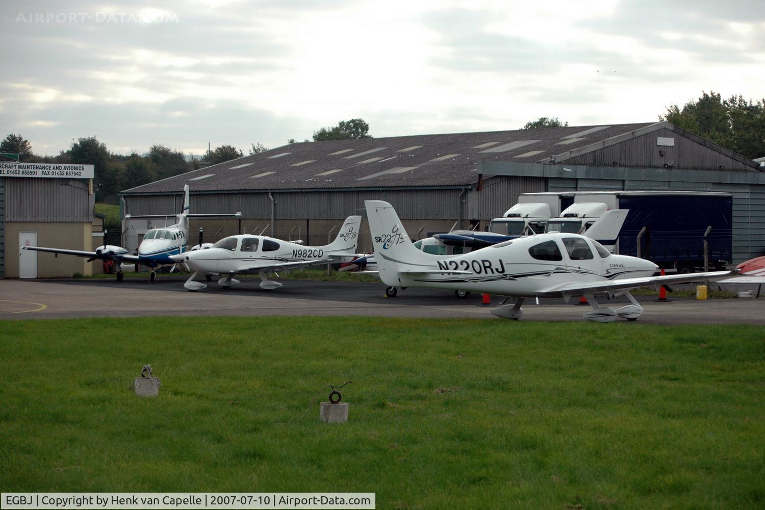 Gloucestershire Airport, Staverton, England United Kingdom (EGBJ) - Two Cirrus SR22s at Staverton Gloucestershire airport, England.