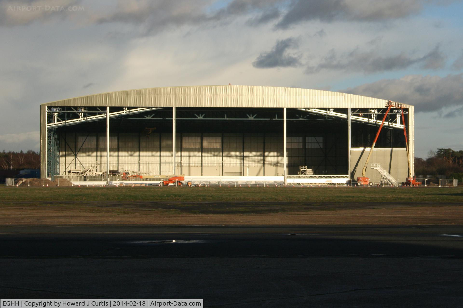 Bournemouth Airport, Bournemouth, England United Kingdom (EGHH) - Work continuing on the '747 hangar' (once the BASCO hangar).