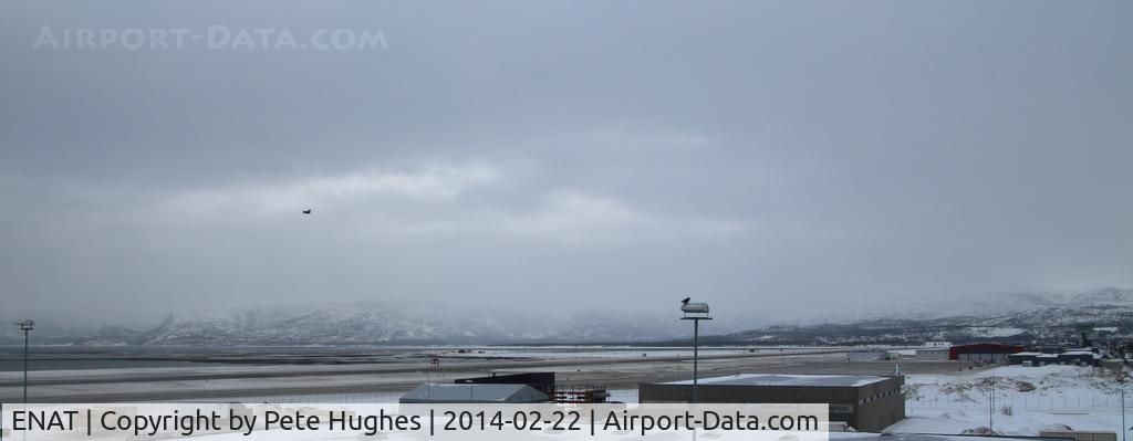 Alta Airport, Alta, Finnmark Norway (ENAT) - Alta's runway viewed across dockside buildings; terminal to rear right of picture.