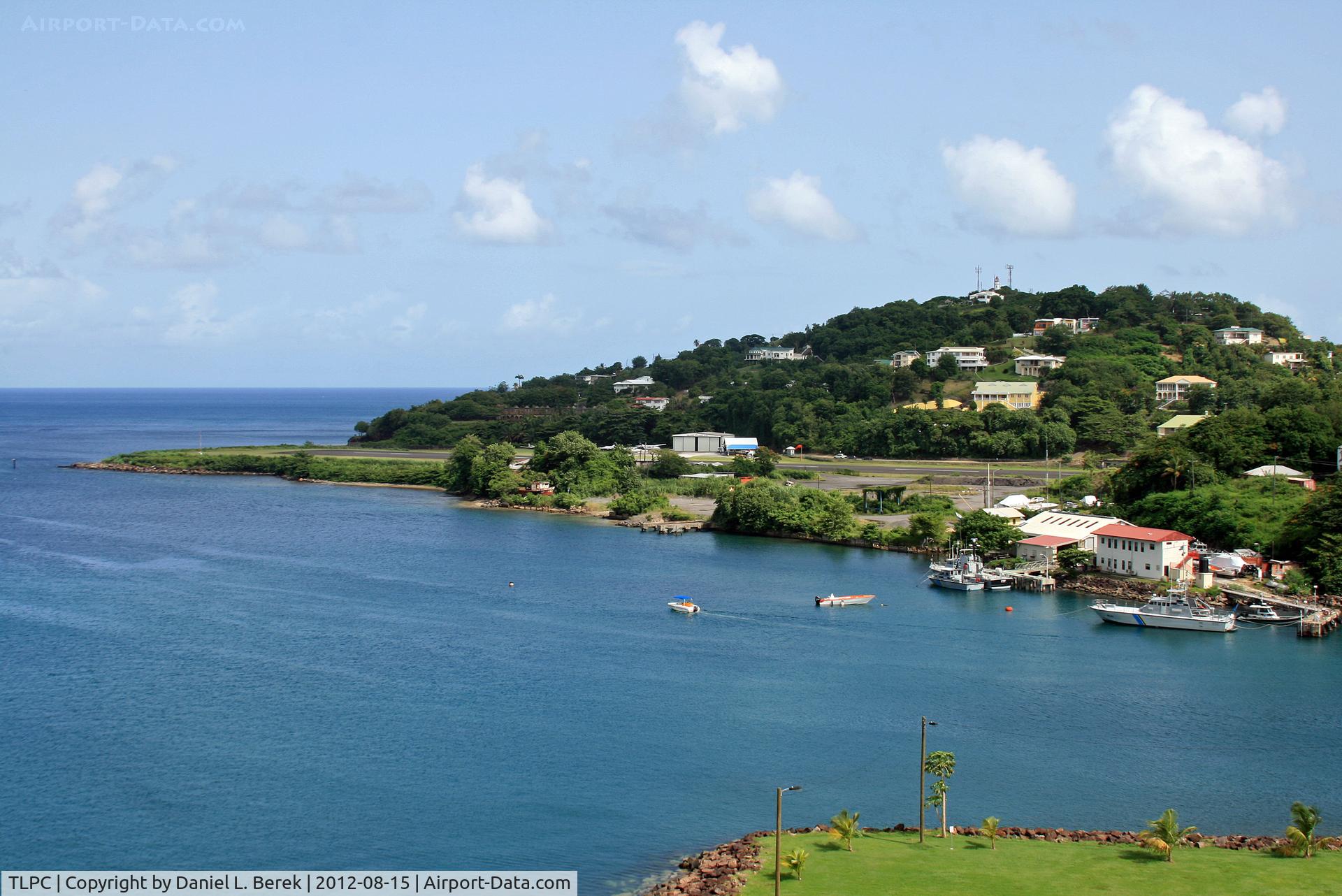 George F. L. Charles Airport (formerly Vigie Airport), Castries, Saint Lucia Saint Lucia (TLPC) - This is a general overview of this little airport, looking from the mountains bordering the harbor of Castries.