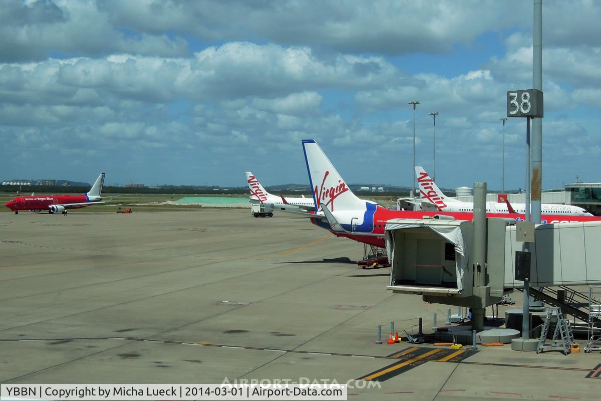 Brisbane International Airport, Brisbane, Queensland Australia (YBBN) - Old Virgin Blue and new Virgin Australia liveries