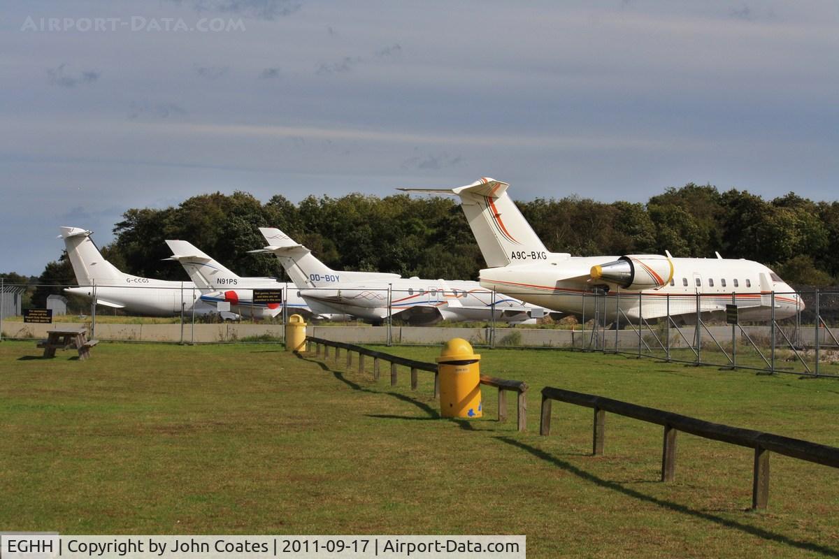 Bournemouth Airport, Bournemouth, England United Kingdom (EGHH) - JETS apron with G-CCGS, N91PS, OD-BOY and A9C-BXG