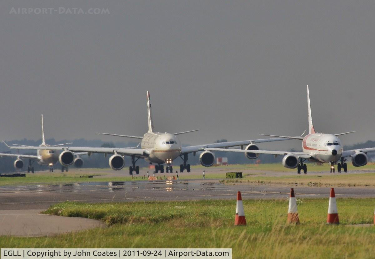 London Heathrow Airport, London, England United Kingdom (EGLL) - The queue for 27L