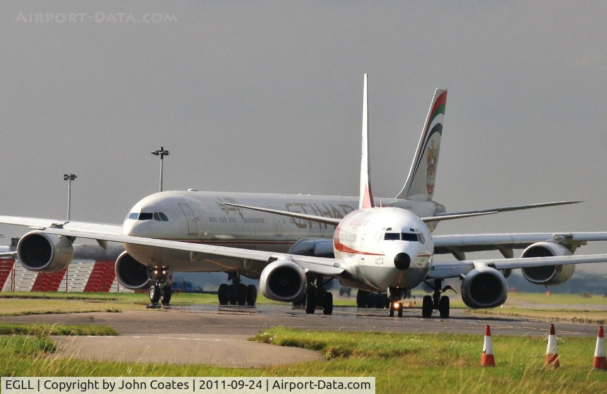 London Heathrow Airport, London, England United Kingdom (EGLL) - Move on down the queue