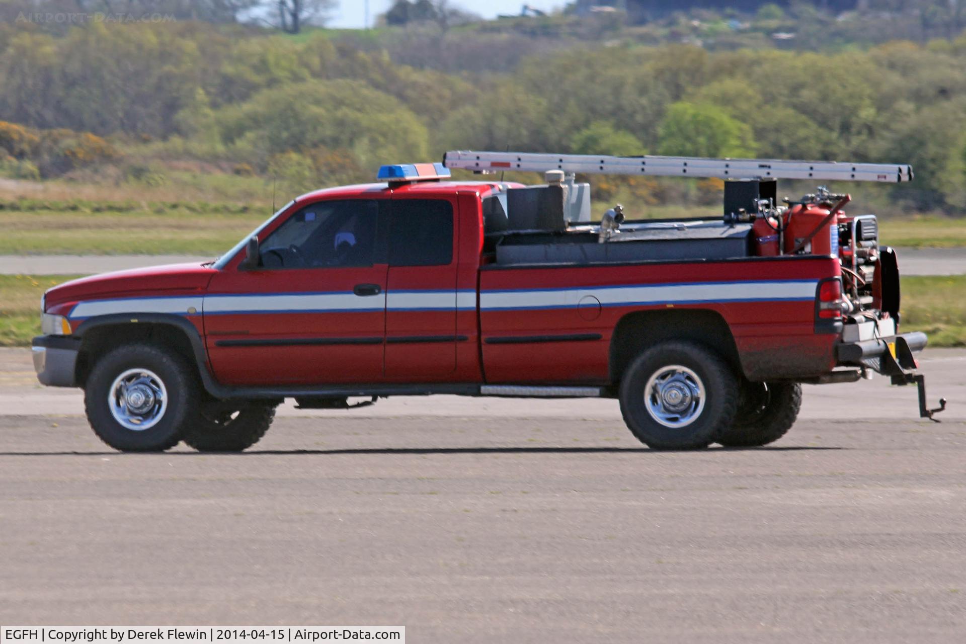 Swansea Airport, Swansea, Wales United Kingdom (EGFH) - EGFH's Fire2 seen crossing the apron.