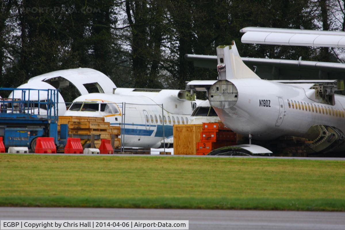 Kemble Airport, Kemble, England United Kingdom (EGBP) - from L to R B-5091 B737 cockpit and three ATR's SX-BIB, SX-BID and N19DZ in the scrapping area at Kemble