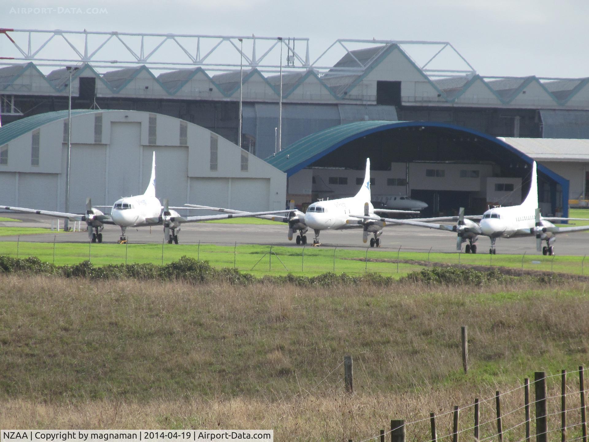Auckland International Airport, Auckland New Zealand (NZAA) - ZK-CIF; KFJ and KFS on cargo apron. This is view from Manukau entry road and public viewing areas.