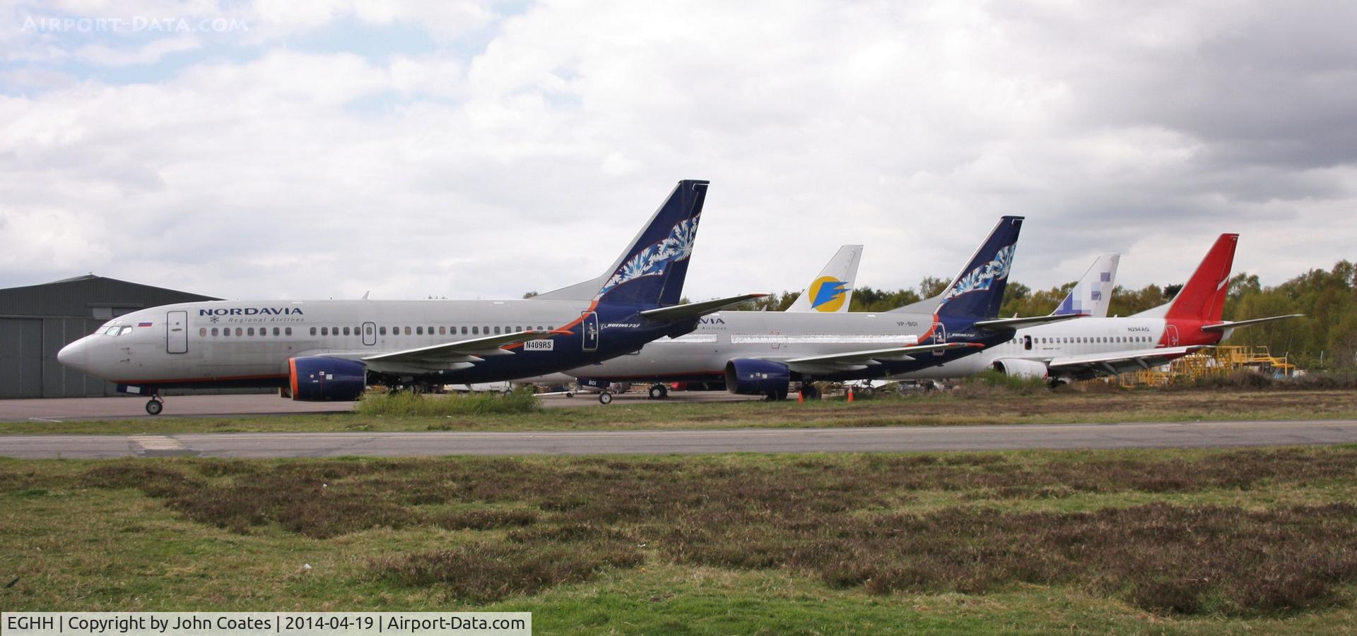 Bournemouth Airport, Bournemouth, England United Kingdom (EGHH) - B737s near European scrapping area include N409RS, VP-BOI, N294AG N506WA and ex Aerosvit last wearing UR-VVQ.