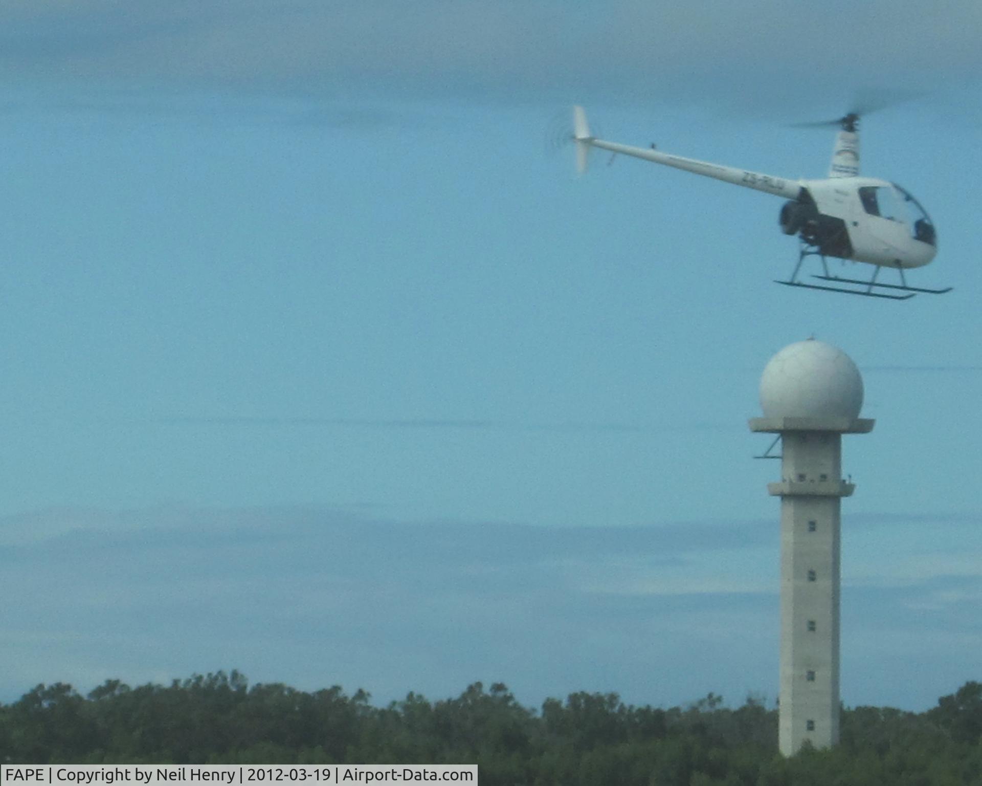 Port Elizabeth Airport, Port Elizabeth South Africa (FAPE) - helicopter ZS-RLU passing Tower, from Terminal building