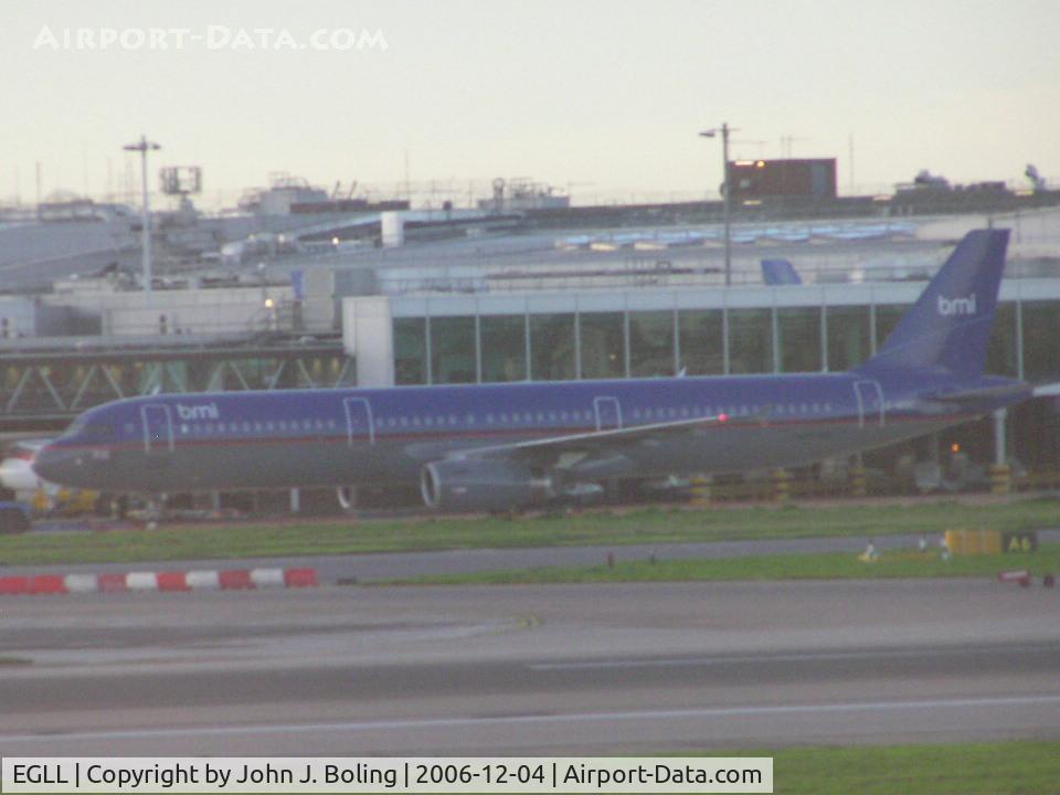 London Heathrow Airport, London, England United Kingdom (EGLL) - BMI A-321 taxi past terminal 1 at Heathrow