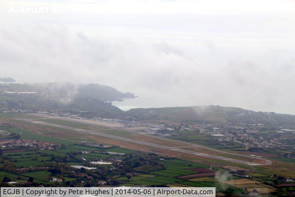 Guernsey Airport, Guernsey, Channel Islands United Kingdom (EGJB) - climbing downwind out of Guernsey in Trislander G-BDTO 6 May 2014