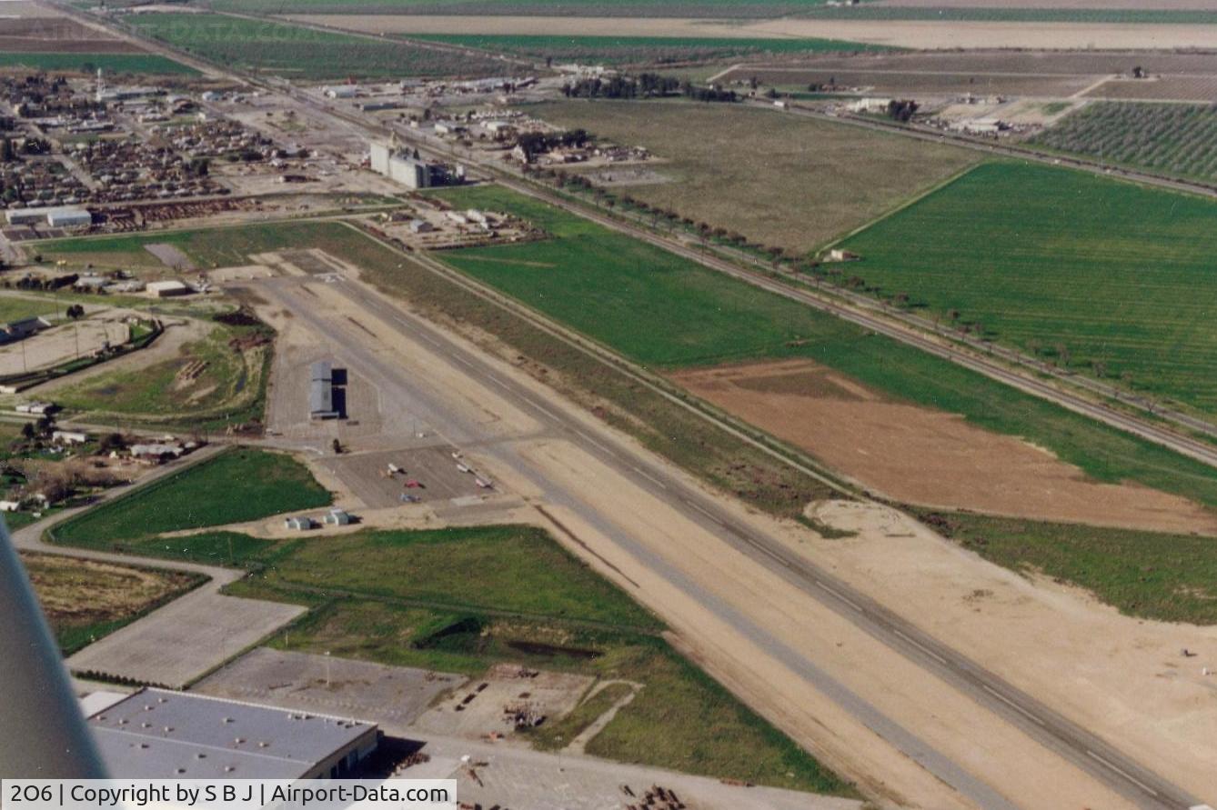 Chowchilla Airport (2O6) - As it looked in 1994. View is north.Most activity is Ag operations. Highway 99 is seen on the far right.