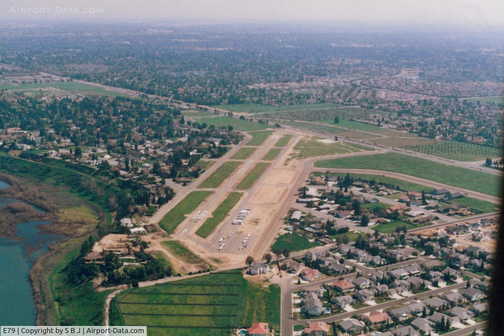 Sierra Sky Park Airport (E79) - Sierra Sky Park around 1998.This was one of the first (if not the first) residential airparks started in 1946 by Bill and Doris Smilie. The cement pad at south end near highway, was the original FBO/sales office and tiedown area.