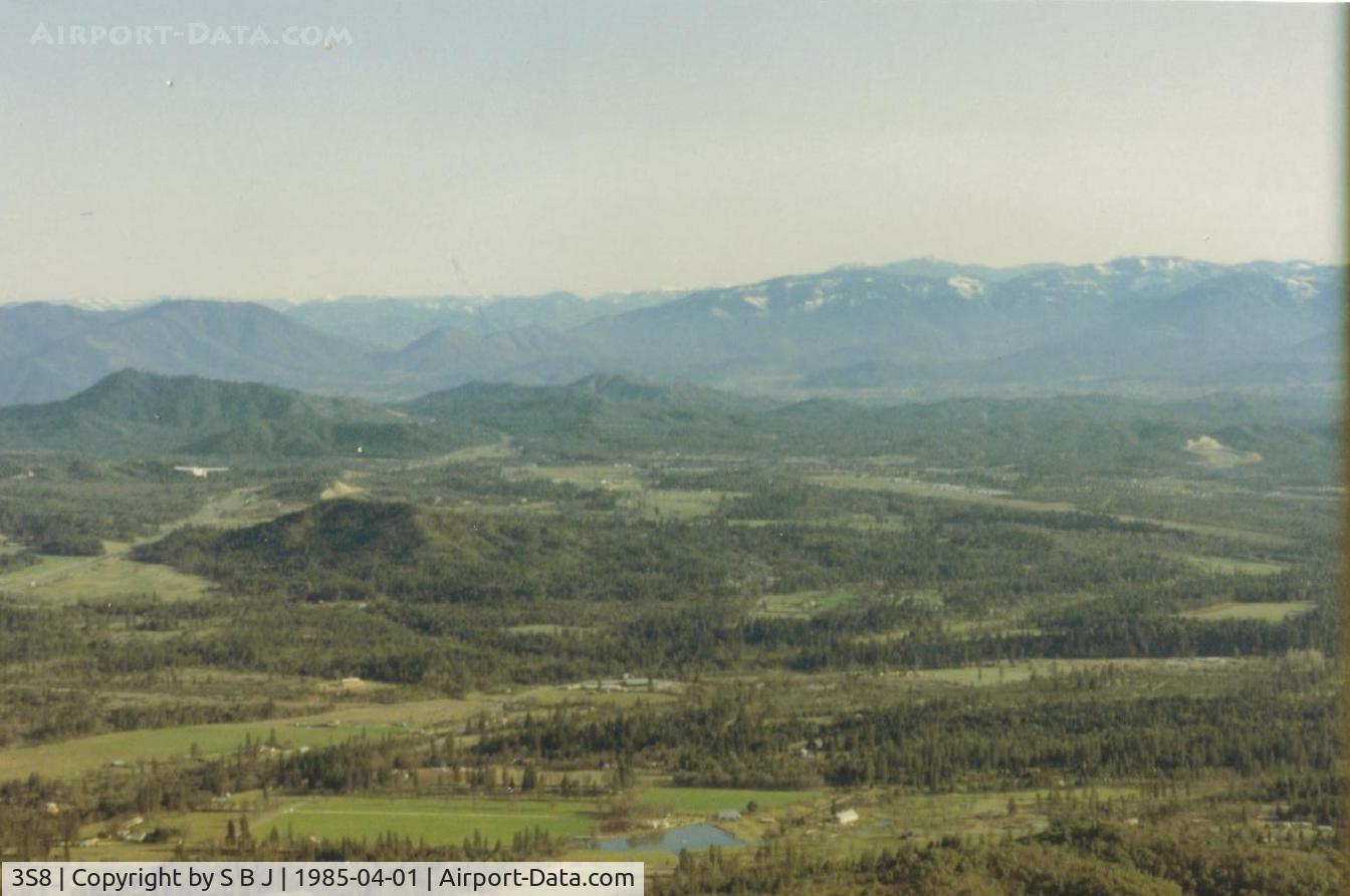 Grants Pass Airport (3S8) - Grants Pass airport in the distance flying in from the North in 1985. Chief 9078E can be seen on the left side of picture.