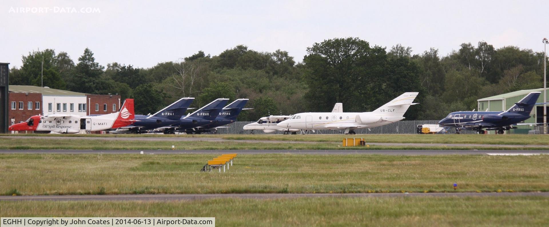 Bournemouth Airport, Bournemouth, England United Kingdom (EGHH) - Cobham apron with regular visitor UR-CLF