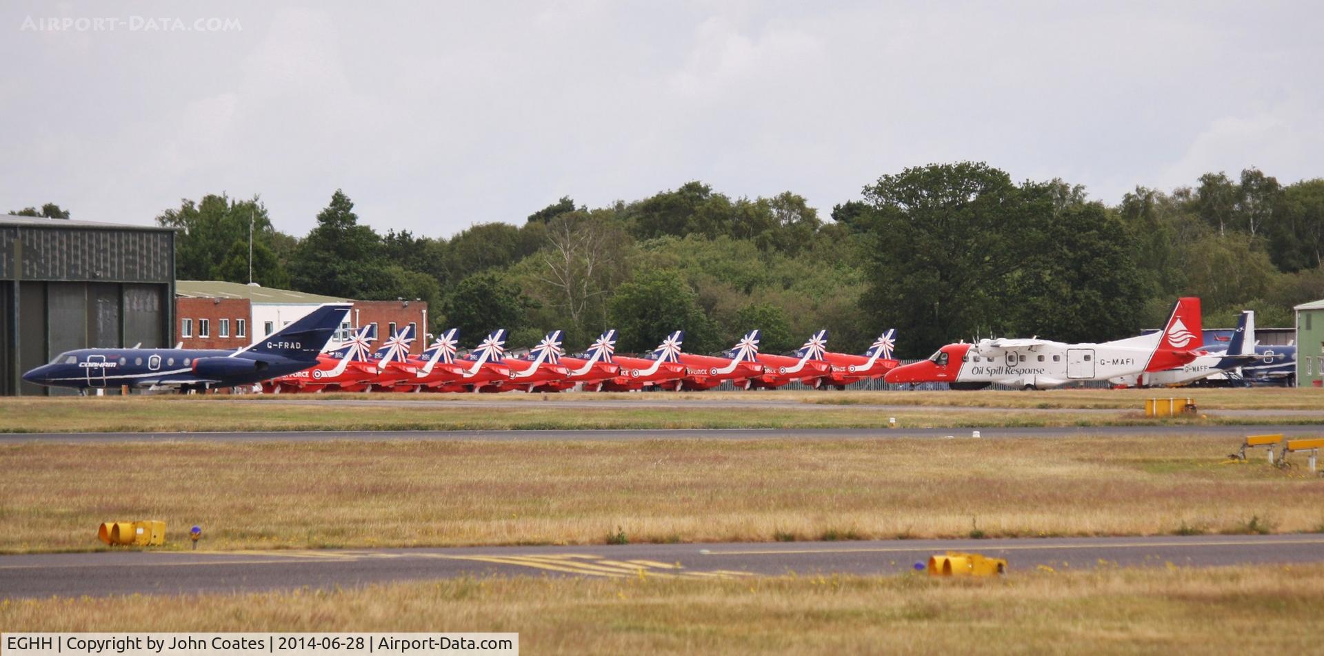 Bournemouth Airport, Bournemouth, England United Kingdom (EGHH) - Busy Cobham apron