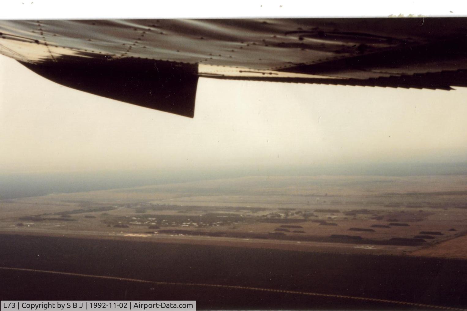 Poso-kern County Airport (L73) - Poso Kern with view to the west.Runway is on the east side with the drag strip on the west. Farm activity is in the center.This was a WW2 landing( square ) field. 