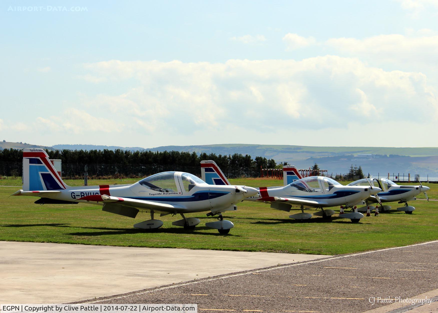 Dundee Airport, Dundee, Scotland United Kingdom (EGPN) - Tayside Aviation Grob G115 Heron's outside their hangar at Dundee Riverside EGPN
