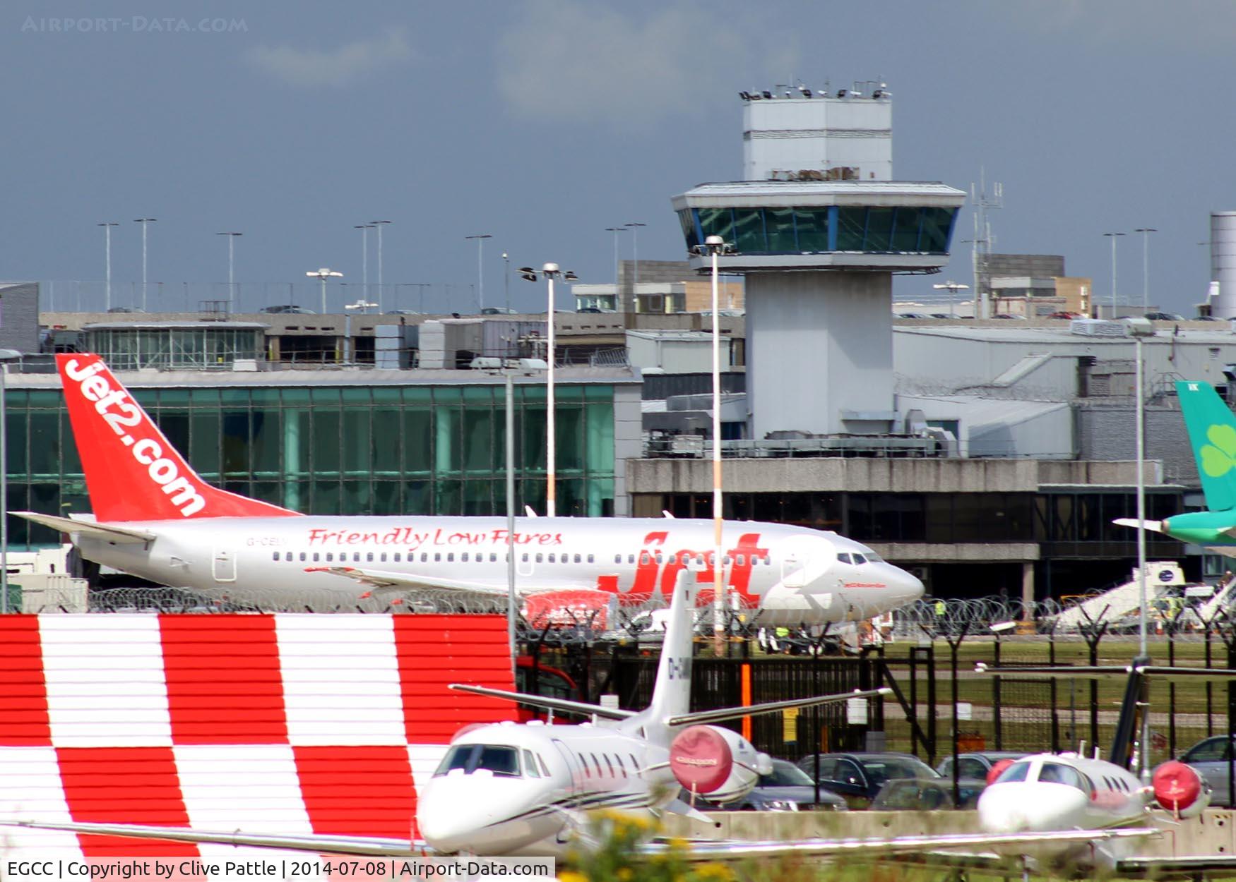 Manchester Airport, Manchester, England United Kingdom (EGCC) - Busy apron scene as viewed from the viewing area at Manchester EGCC