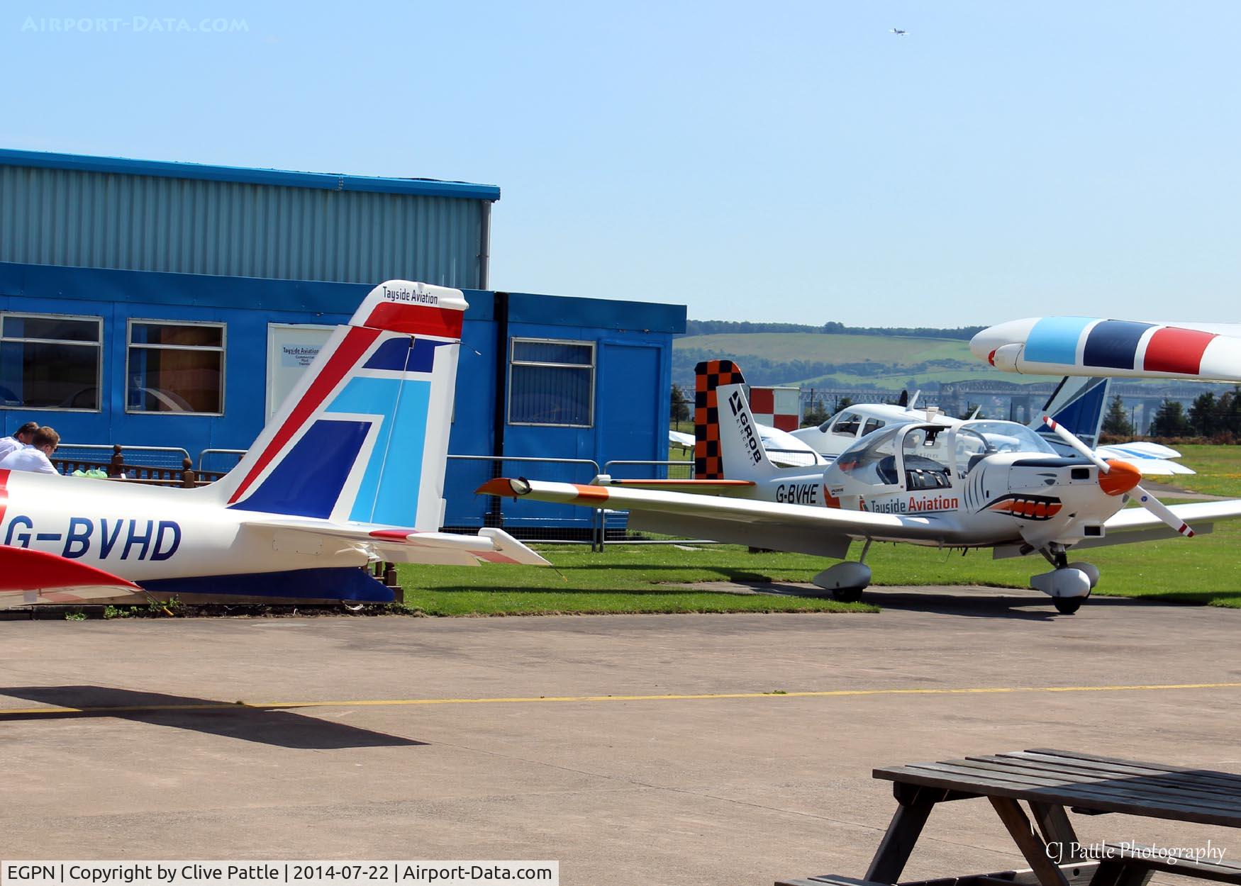 Dundee Airport, Dundee, Scotland United Kingdom (EGPN) - Tayside Aviation maintenance hangar apron and Club rest area at Dundee Riverside EGPN
