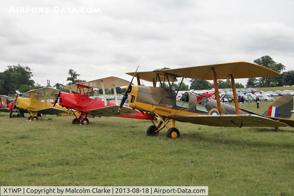 X1WP Airport - The Tiger Moth parking area at The De Havilland Moth Club's 28th International Moth Rally at Woburn Abbey Park. August 2013.