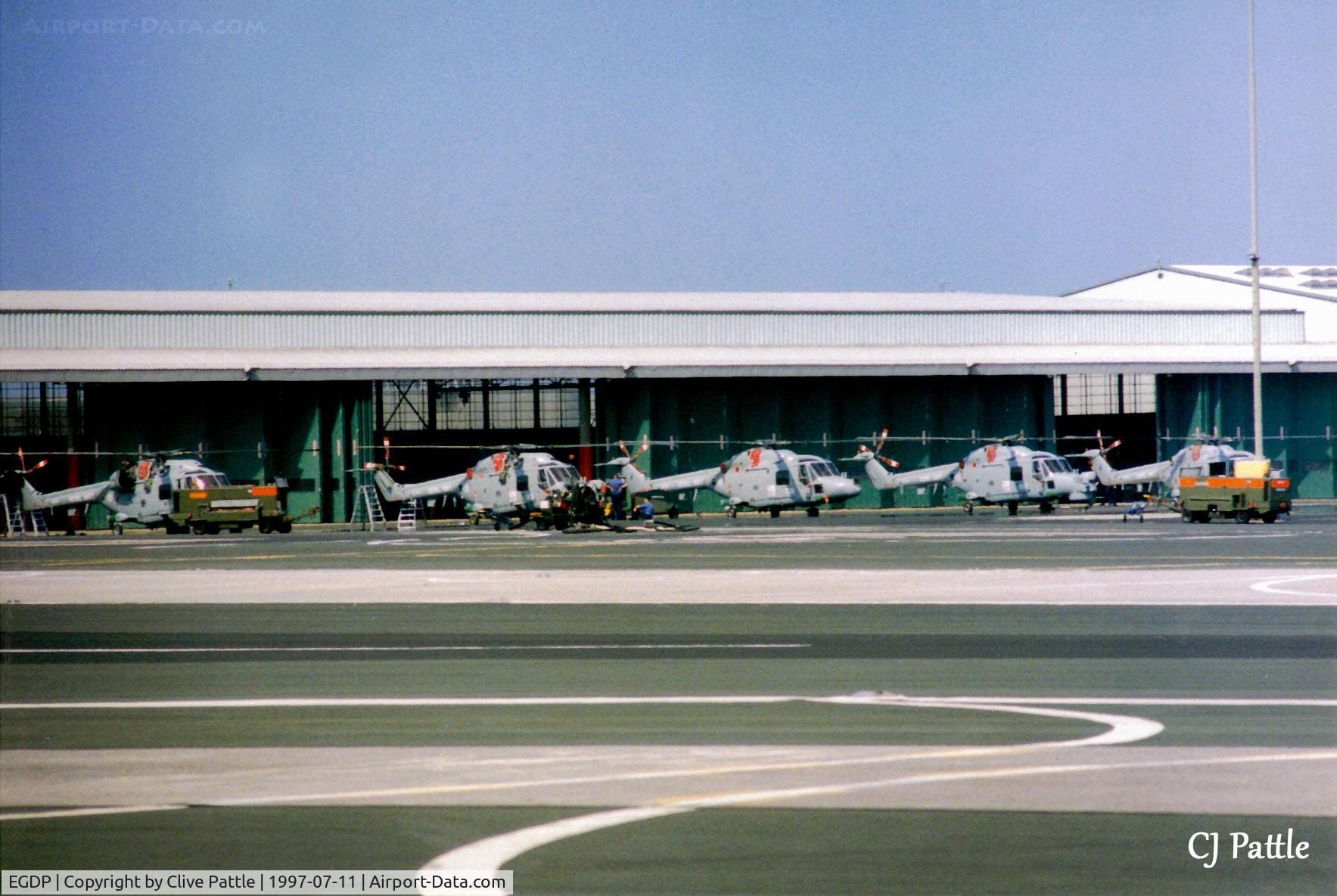 RNAS Portland Heliport Airport, Portland Harbour, England United Kingdom (EGDP) - Scanned from print. A line-up of resident Lynx at HMS Osprey, Portland, Dorset in July 1997.