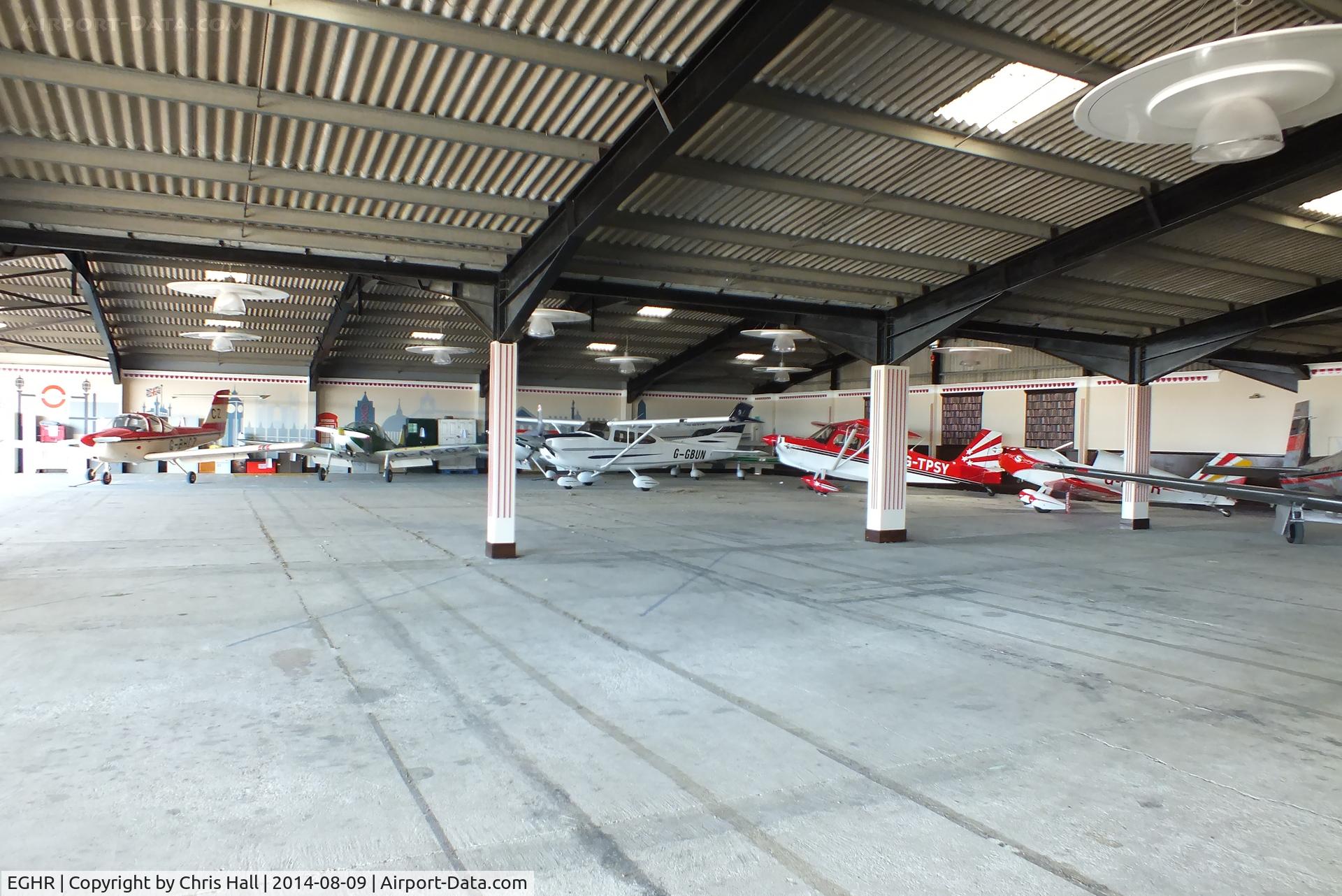 Goodwood Airfield Airport, Chichester, England United Kingdom (EGHR) - inside the main hangar at Goodwood