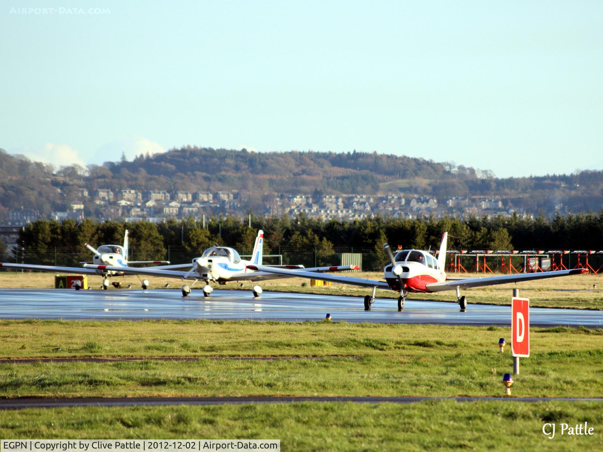 Dundee Airport, Dundee, Scotland United Kingdom (EGPN) - Winter sunset line-up with the Kingdom of Fife in the background