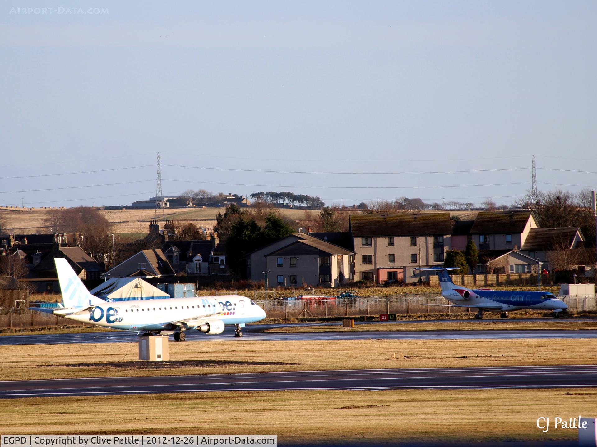 Aberdeen Airport, Aberdeen, Scotland United Kingdom (EGPD) - Last rays of winter sun highlight the runway threshold
