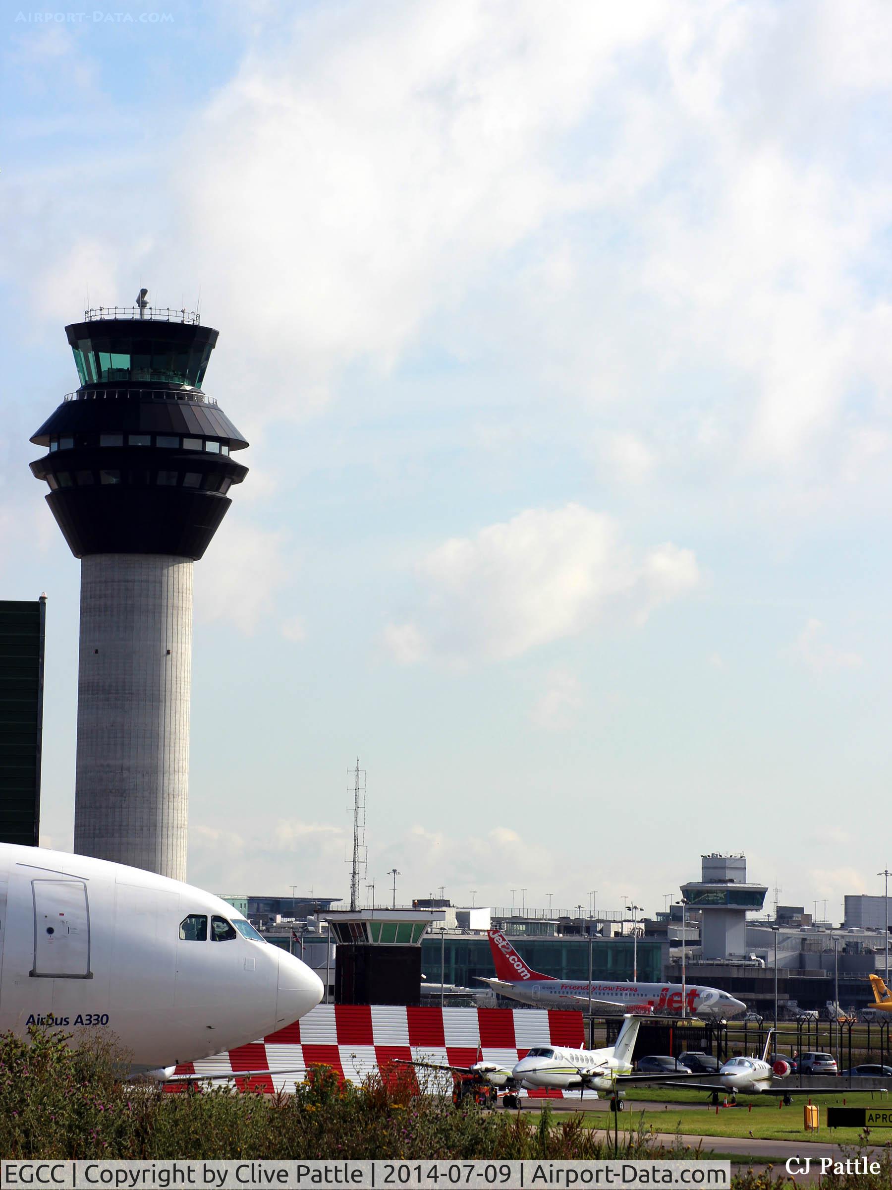 Manchester Airport, Manchester, England United Kingdom (EGCC) - New Tower at Manchester EGCC with parked GA