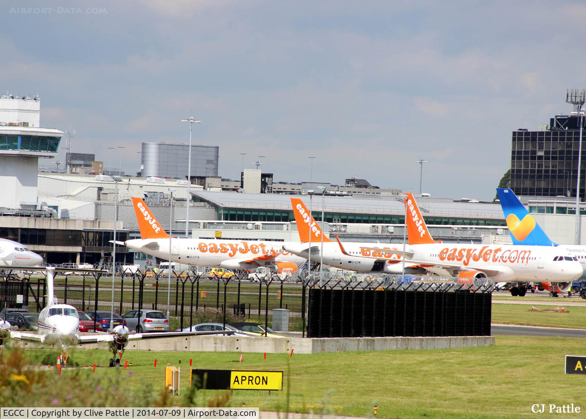 Manchester Airport, Manchester, England United Kingdom (EGCC) - A Swarm of Tails at Manchester Airport EGCC
