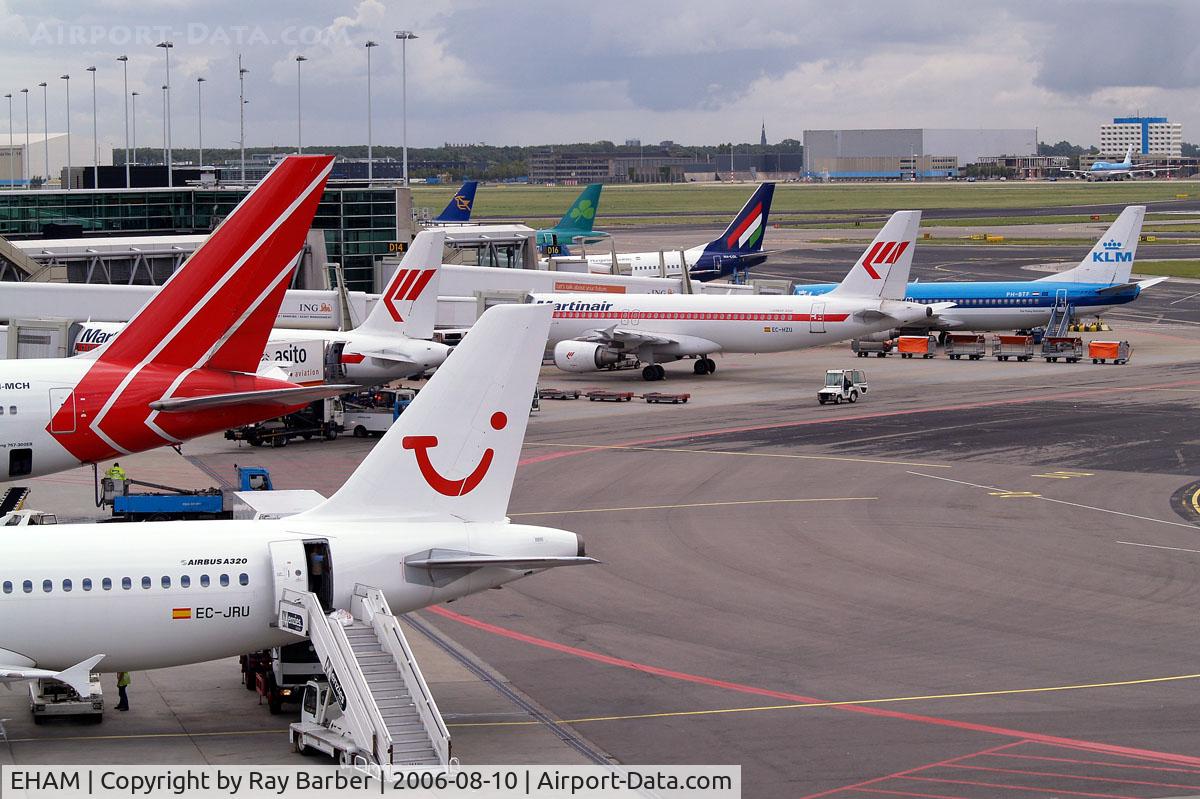 Amsterdam Schiphol Airport, Haarlemmermeer, near Amsterdam Netherlands (EHAM) - Showing a number of Airlines using the airport.
