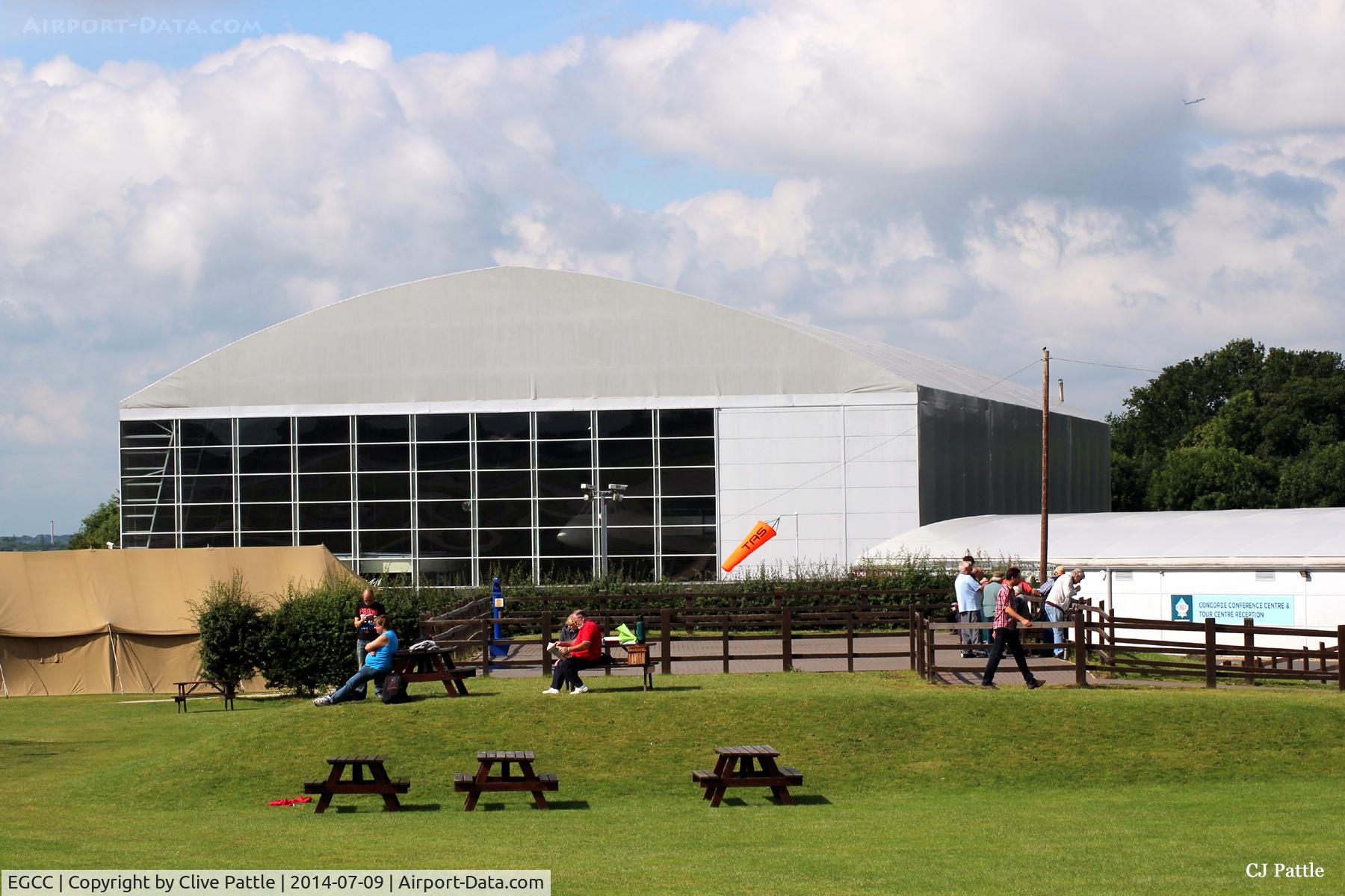 Manchester Airport, Manchester, England United Kingdom (EGCC) - View of excellent viewing enclosure with Concorde Hangar and Restaurant behind. - at Manchester EGCC