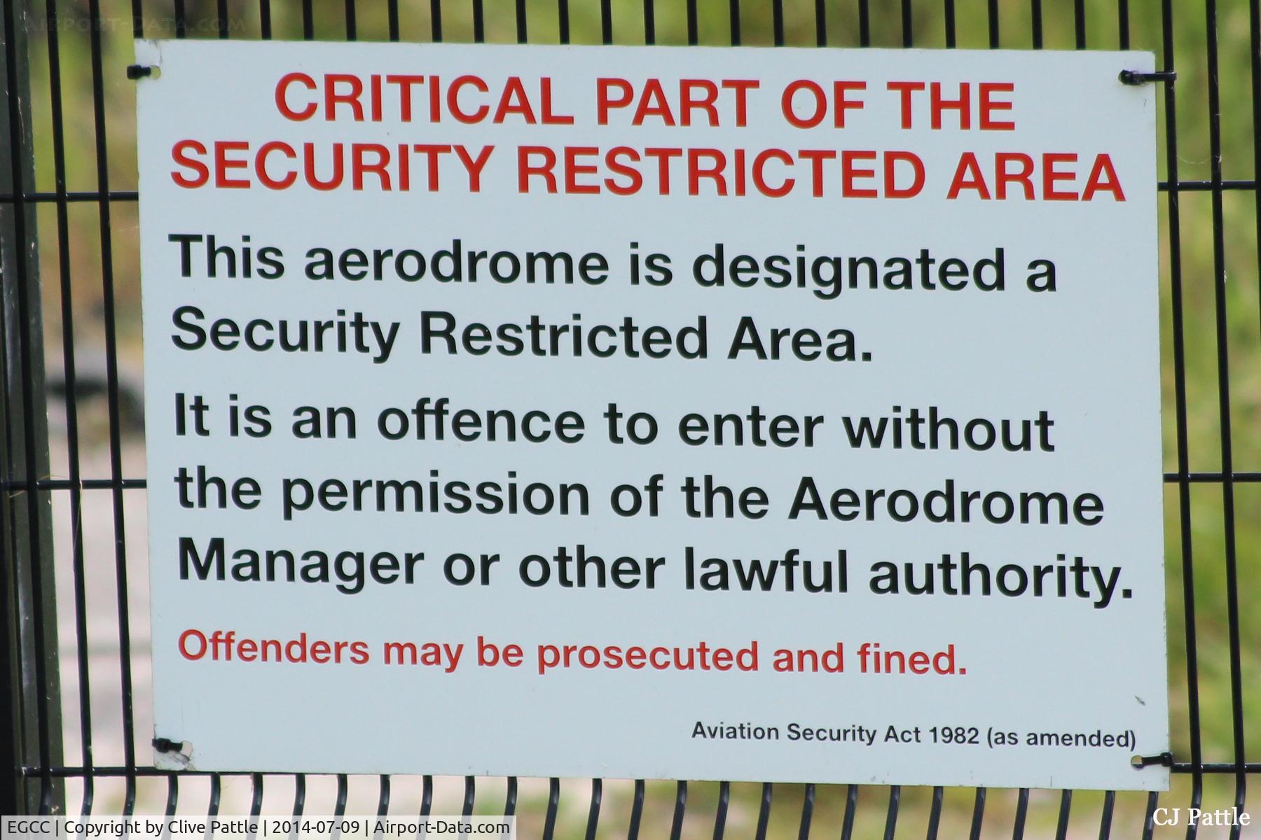 Manchester Airport, Manchester, England United Kingdom (EGCC) - Sign on fence at Manchester EGCC - you have been warned !