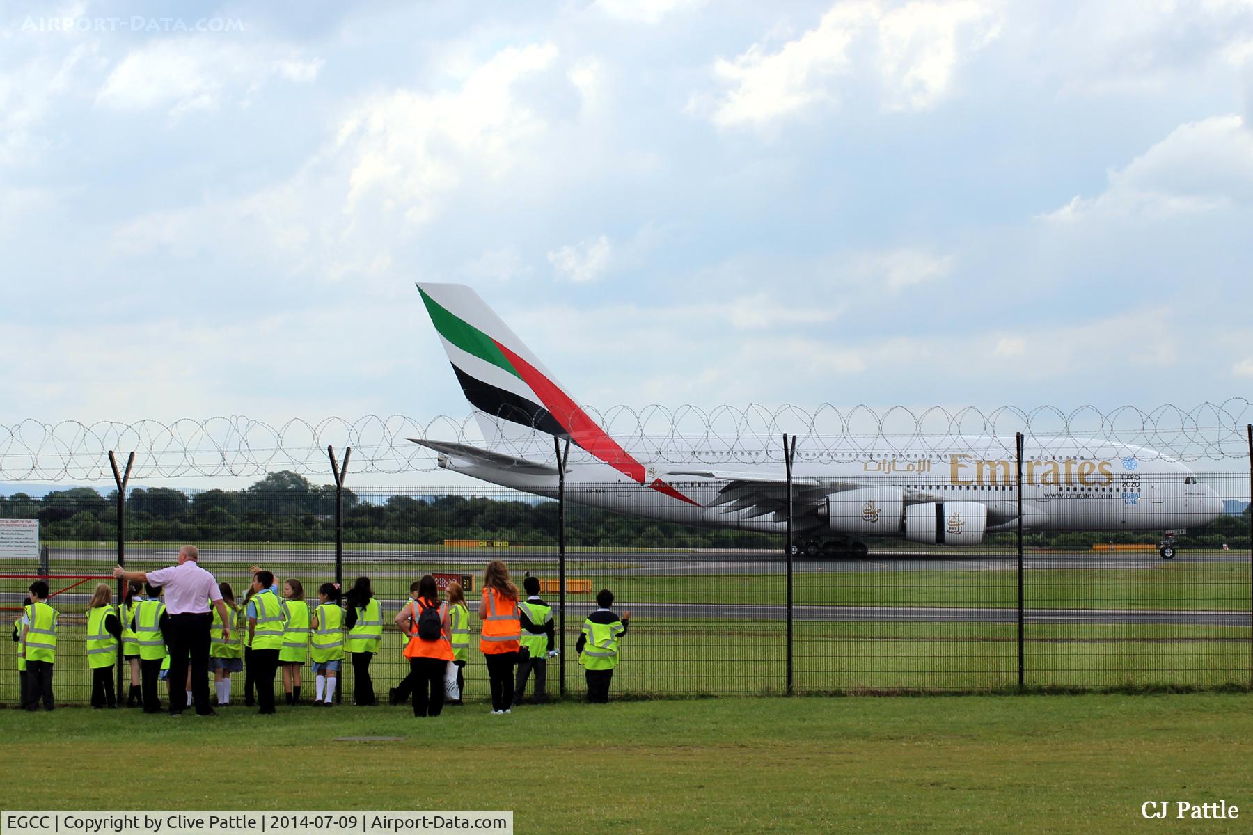 Manchester Airport, Manchester, England United Kingdom (EGCC) - A group of visiting school children (future enthusiasts ?) enjoy the facilities at the viewing enclosure at Manchester Airport EGCC.