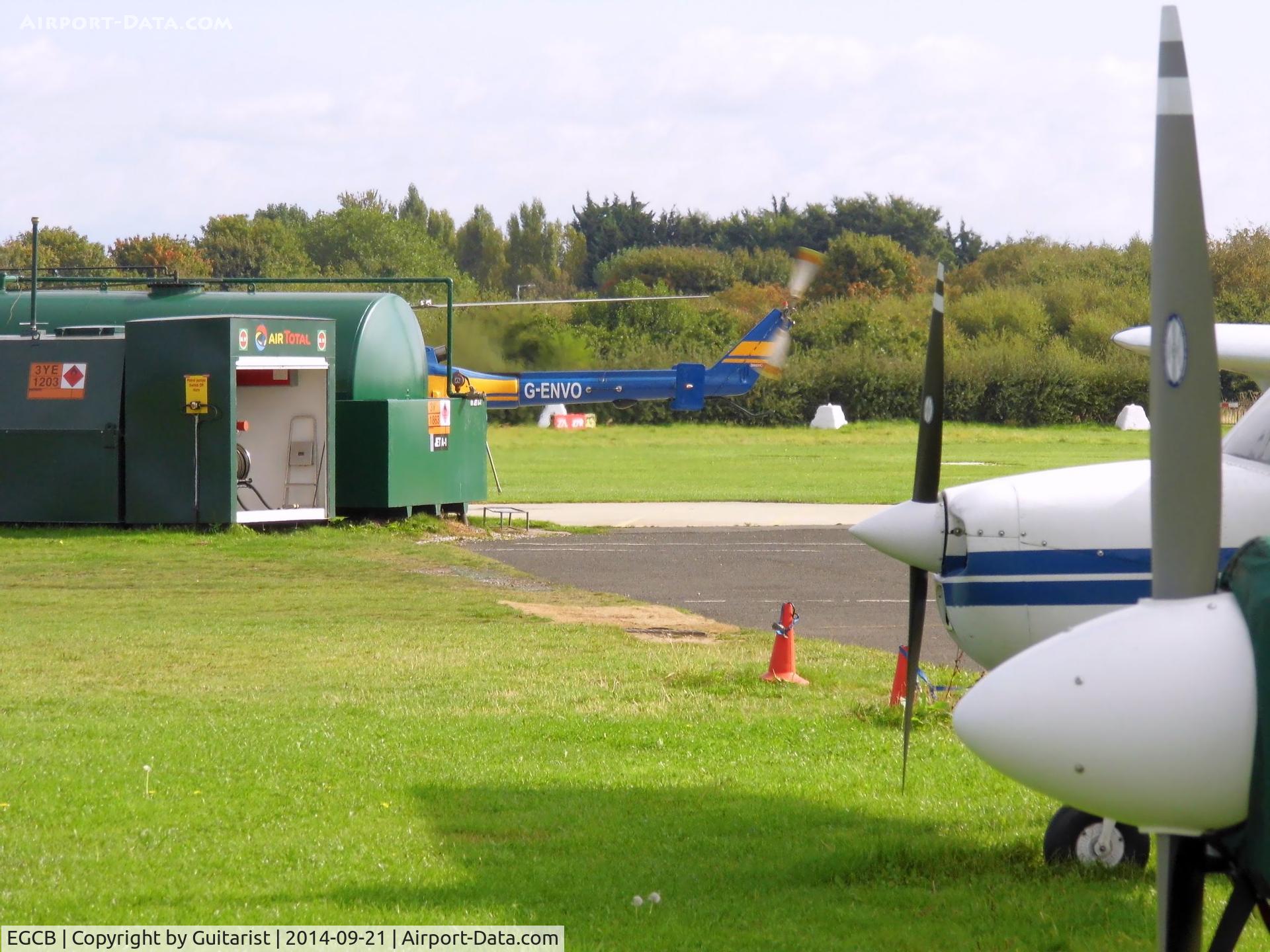 City Airport Manchester, Manchester, England United Kingdom (EGCB) - Helicopter G-ENVO refuelling at the City Airport Manchester