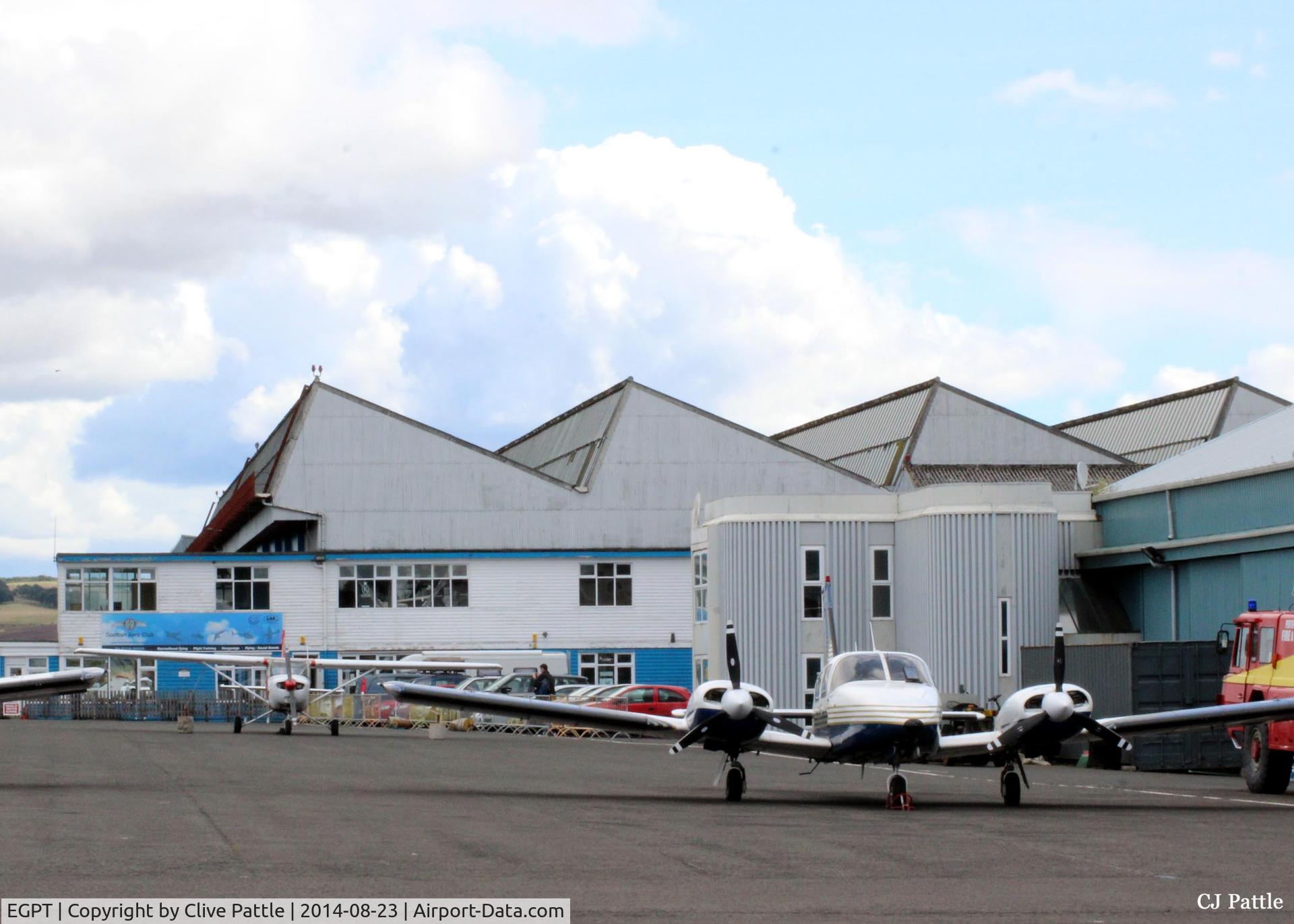 Perth Airport (Scotland), Perth, Scotland United Kingdom (EGPT) - Main apron at Perth EGPT looking east towards the Scottish Aero Club hangar.