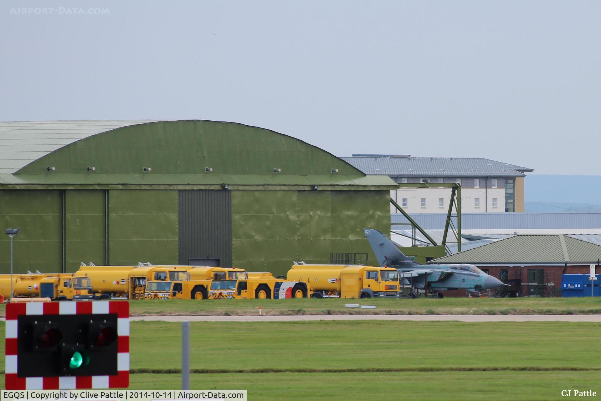 RAF Lossiemouth Airport, Lossiemouth, Scotland United Kingdom (EGQS) - WWII hangar with modern build behind at RAF Lossiemouth EGQS