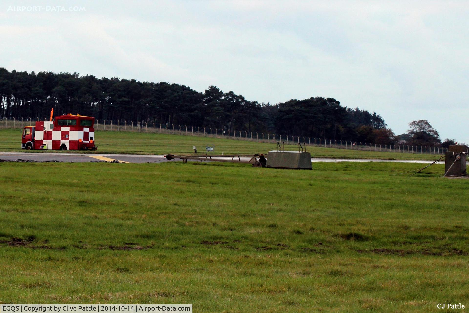 RAF Lossiemouth Airport, Lossiemouth, Scotland United Kingdom (EGQS) - Close up of the  Flight Ops caravan and arrestor gear at the threshold area of runway 05 at RAF Lossiemouth EGQS