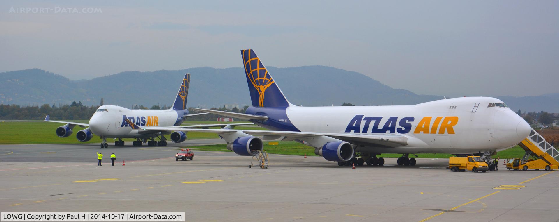 Graz Airport, Graz Austria (LOWG) - 2 B744F transporting RedBull aircrafts for the AirRace-Finale in Zeltweg, at LOWG
