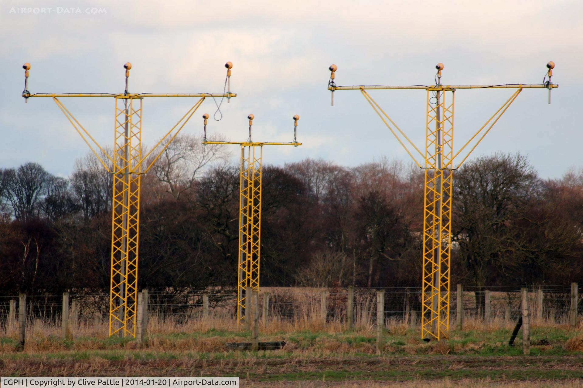 Edinburgh Airport, Edinburgh, Scotland United Kingdom (EGPH) - A section of the runway lighting gantries situated on the north side of the airport.