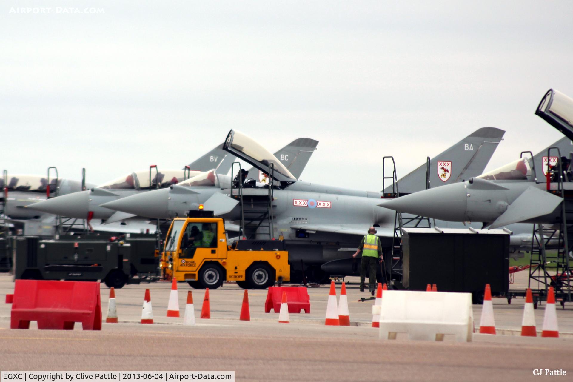 RAF Coningsby Airport, Coningsby, England United Kingdom (EGXC) - Close-up  of 29 R Sqn apron line-up at RAF Coningsby. Photo taken at the BBMF car park/layby