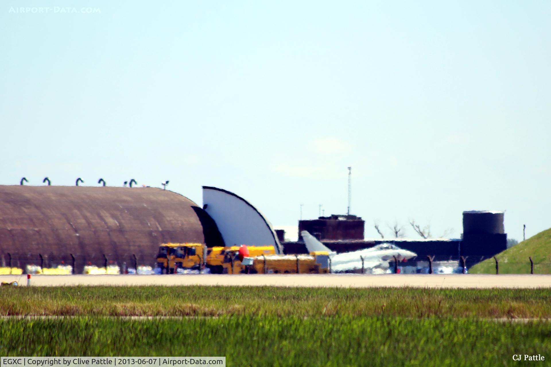RAF Coningsby Airport, Coningsby, England United Kingdom (EGXC) - Heat Haze view of HAS complex at RAF Coningsby