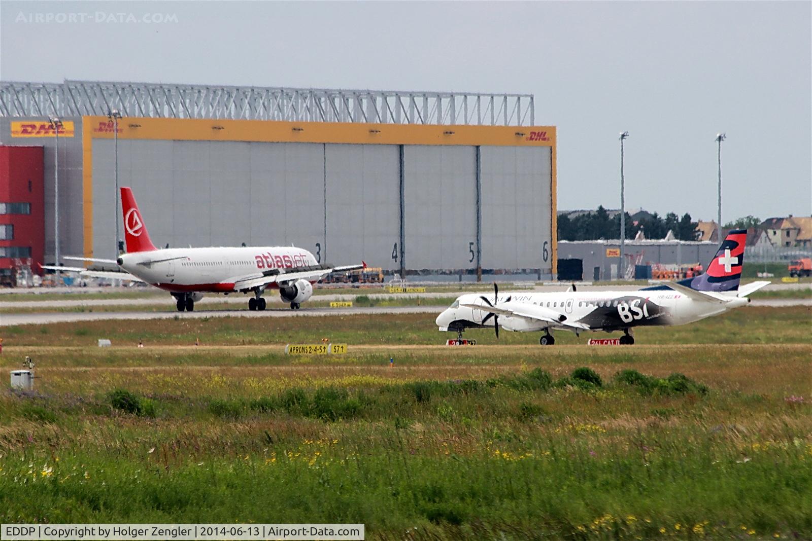 Leipzig/Halle Airport, Leipzig/Halle Germany (EDDP) - Red has arrived from AYT and white is expecting departure to CDG...