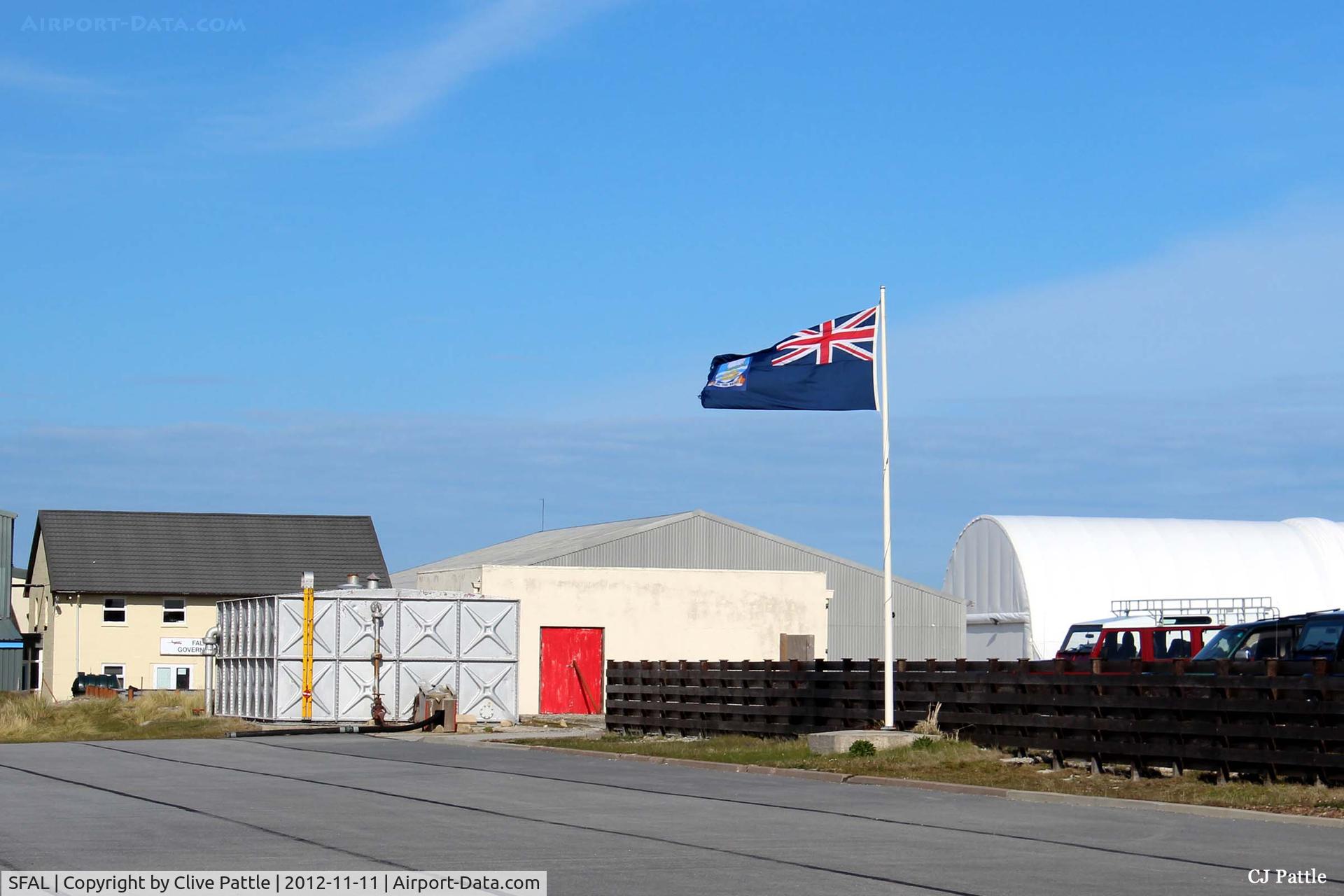 SFAL Airport - The easternmost corner of the main apron with the FIGAS (Falkland Islands Government Air Service) HQ building in the rear