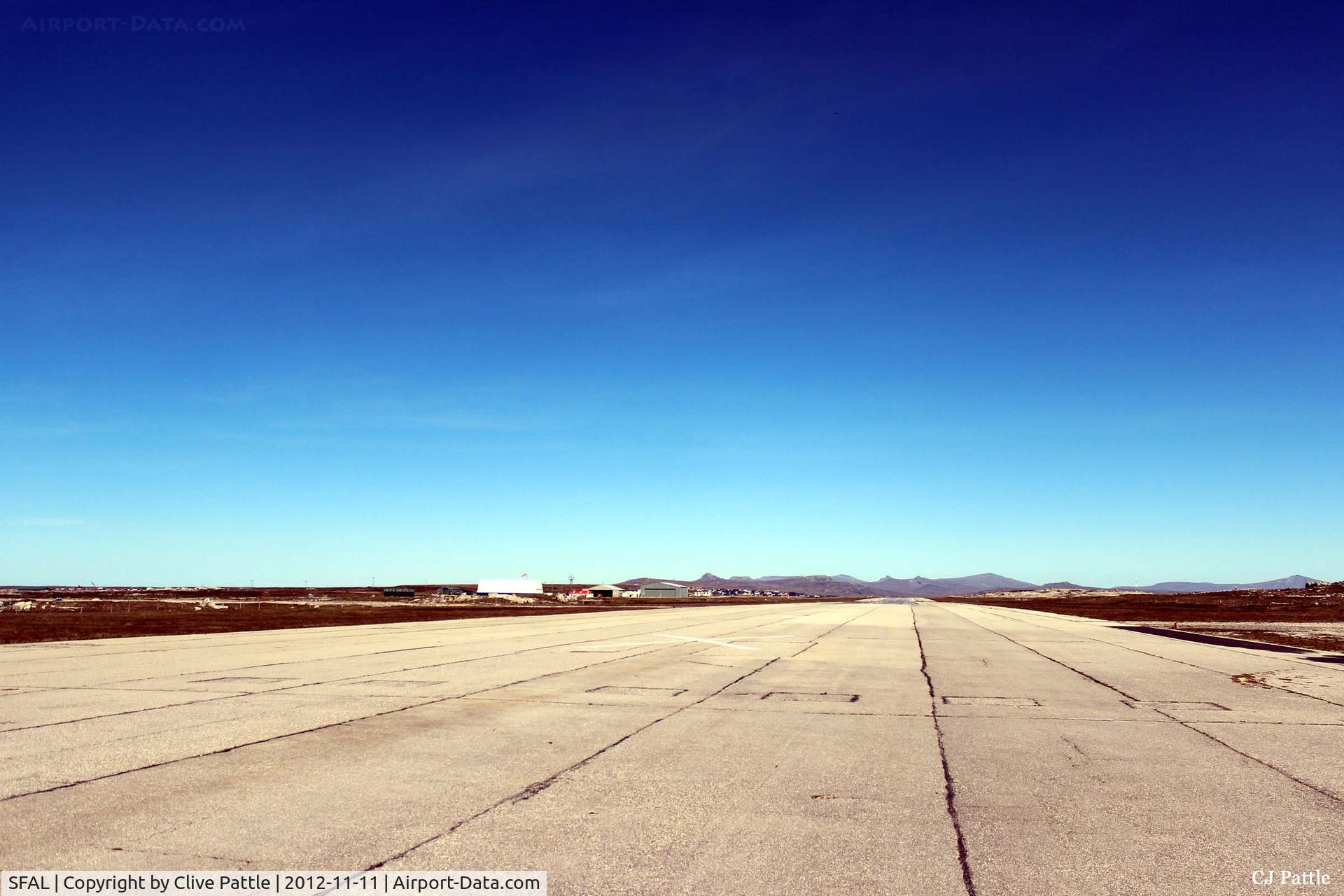 SFAL Airport - A long view westwards down the length of the single runway at Port Stanley.