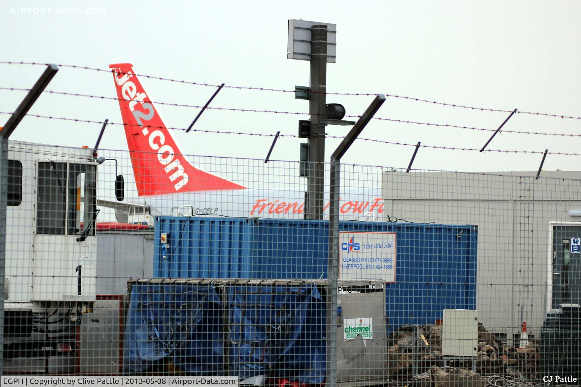 Edinburgh Airport, Edinburgh, Scotland United Kingdom (EGPH) - Through the fence shot of the cargo area at Edinburgh's north side